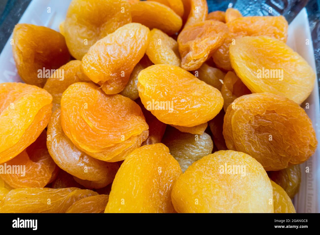 Dried Apricot (Prunus) fruit in a jar Stock Photo Alamy