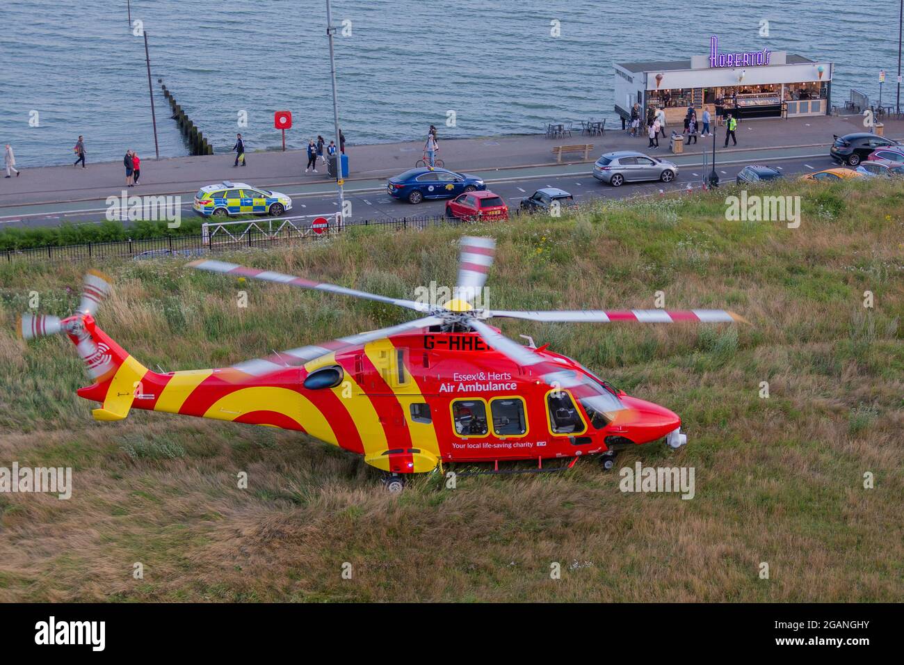 Southend-on-Sea, UK. 31st Jul, 2021. The Essex & Herts air ambulance lands close to seafront in Southend-on-Sea, UK, to attend an emergency incident. Penelope Barritt/Alamy Live News Stock Photo