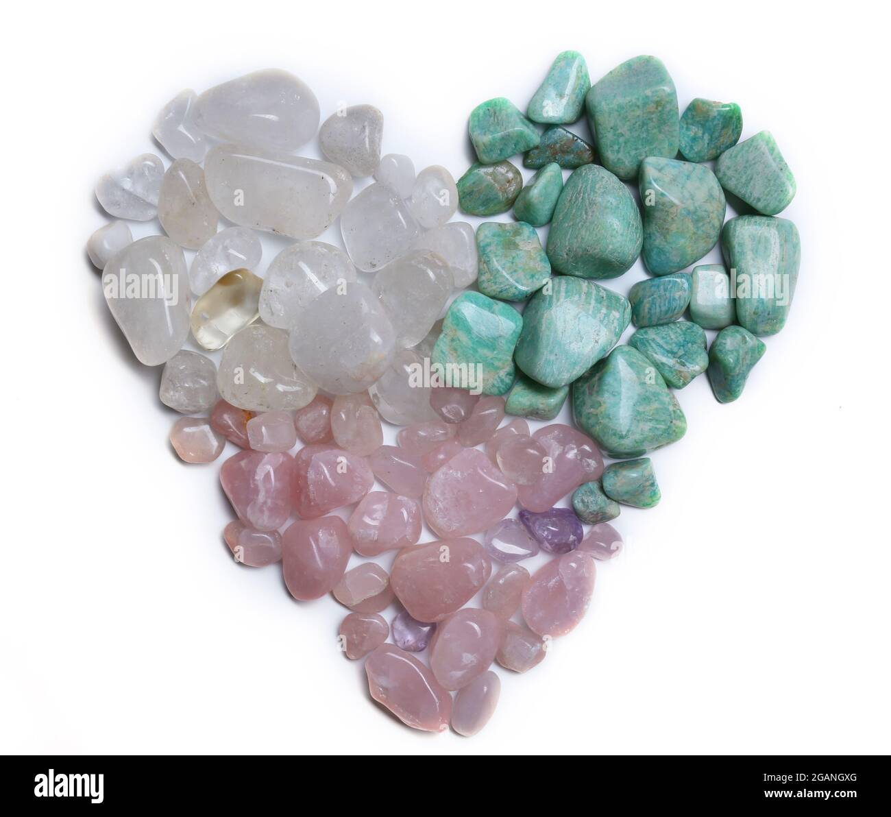 Heart shape of mineral stones azonite, pink quartz, rock crystal