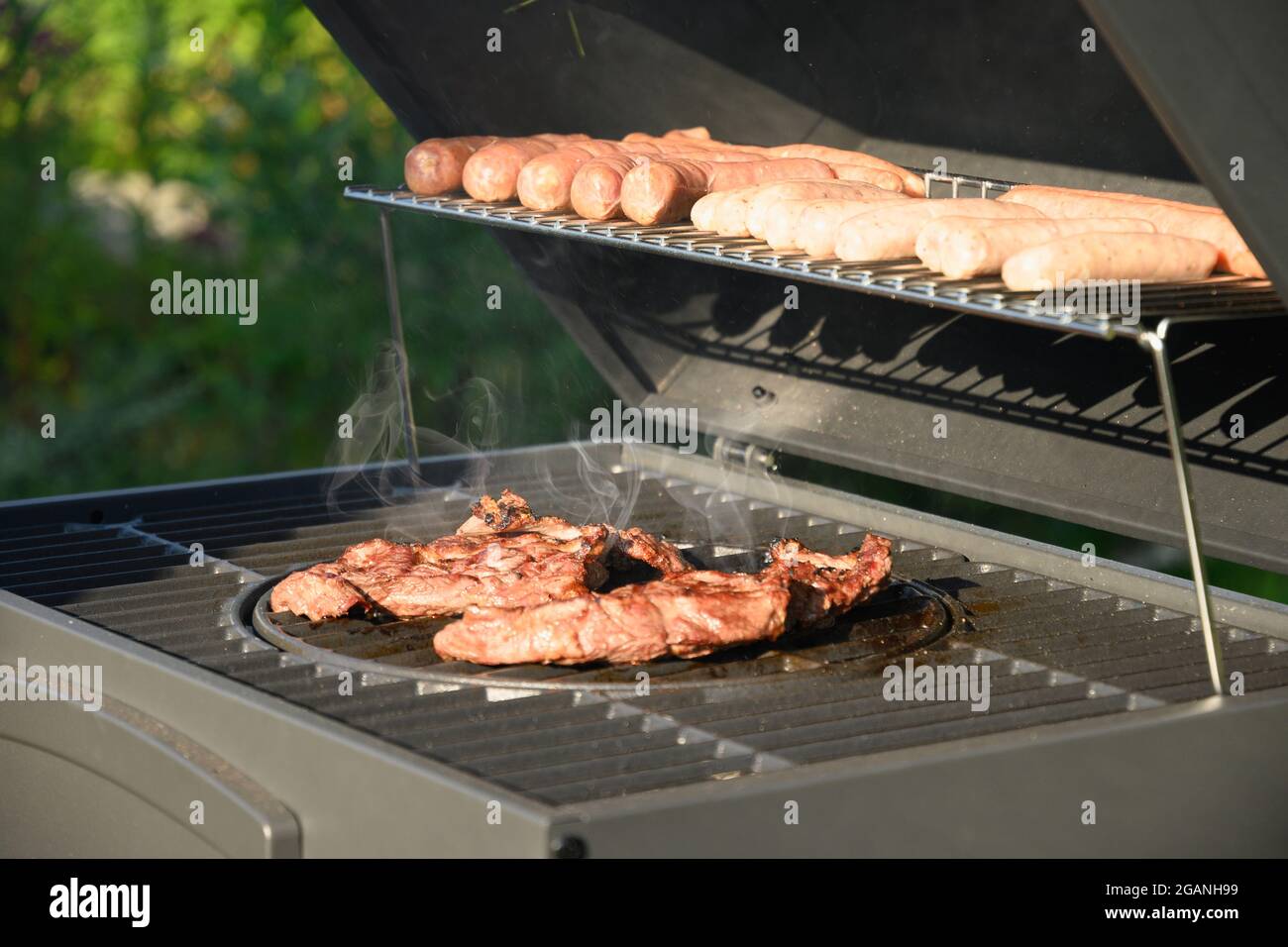 Grill beef meat BBQ grill. Barbecue party. Outdoors. Stock Photo