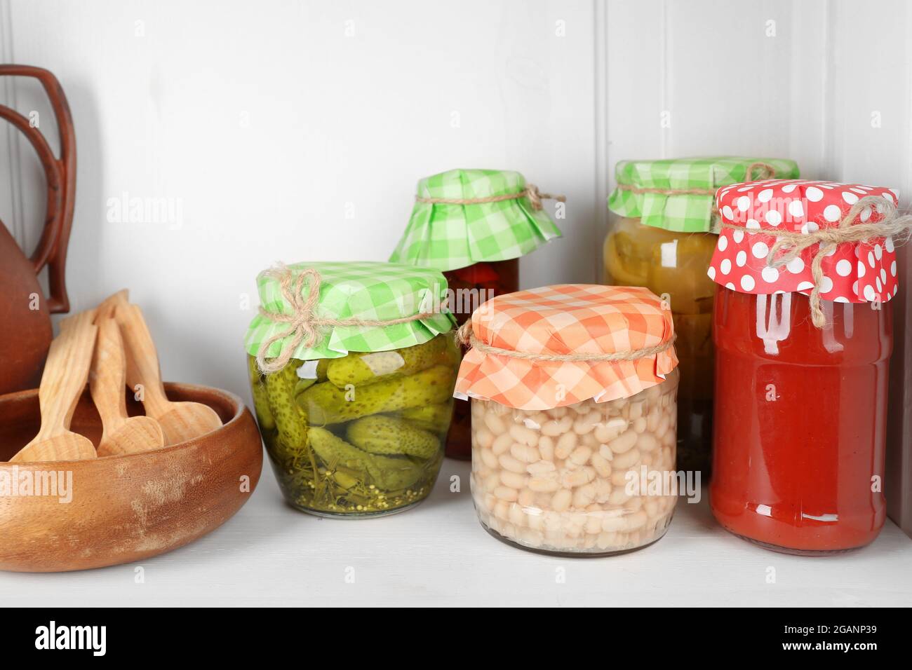 Jars with pickled vegetables on shelf Stock Photo Alamy