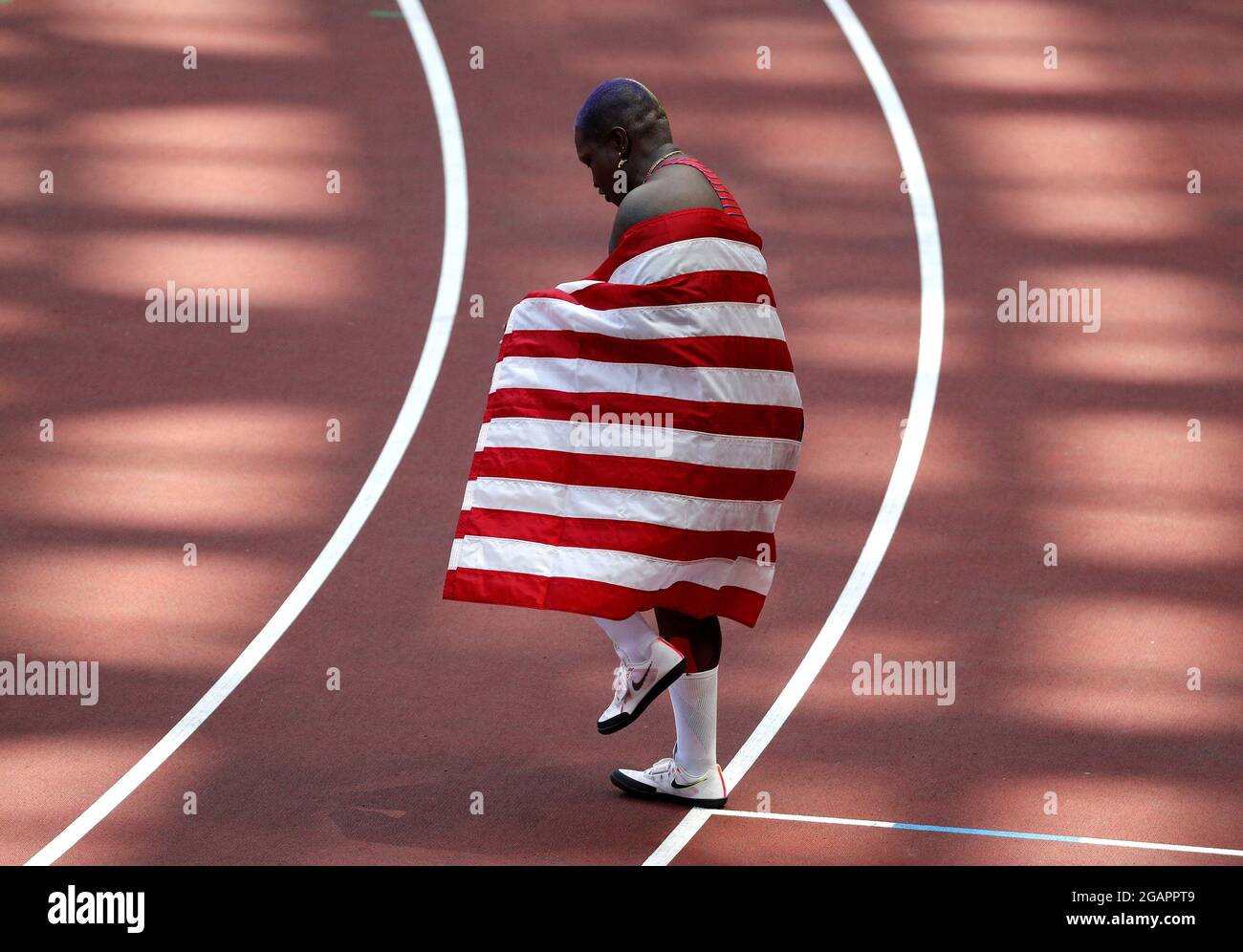 Tokyo, Japan. 31st July, 2021. Raven Saunders of the USA holds the national flag after winning the silver medal in Women's Shot Put at the Athletics competition during the Tokyo Summer Olympics in Tokyo, Japan, on Sunday, August 1, 2021. Photo by Bob Strong/UPI. Credit: UPI/Alamy Live News Stock Photo