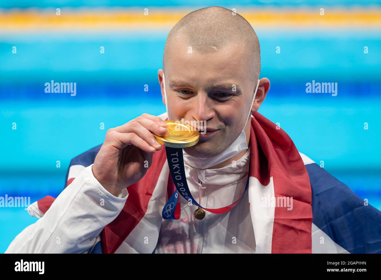 tokyo-japan-july-26-adam-peaty-of-great-britain-shows-the-gold