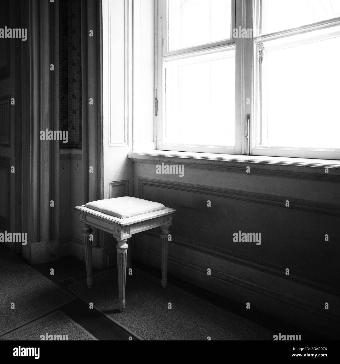 Retro style Monochrome image vintage room with window and chair Stock
