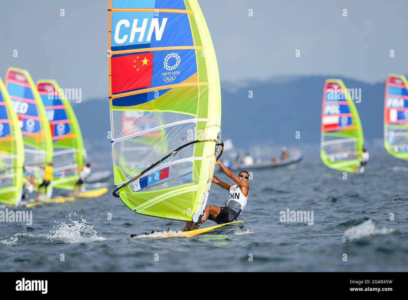 TOKYO, JAPAN - JULY 31: Kun Bi of China competing on Men's Windsufer - RS:X during the Tokyo 2020 Olympic Games at the Sagami on July 31, 2021 in Tokyo, Japan (Photo by Ronald Hoogendoorn/Orange Pictures) NOCNSF Stock Photo