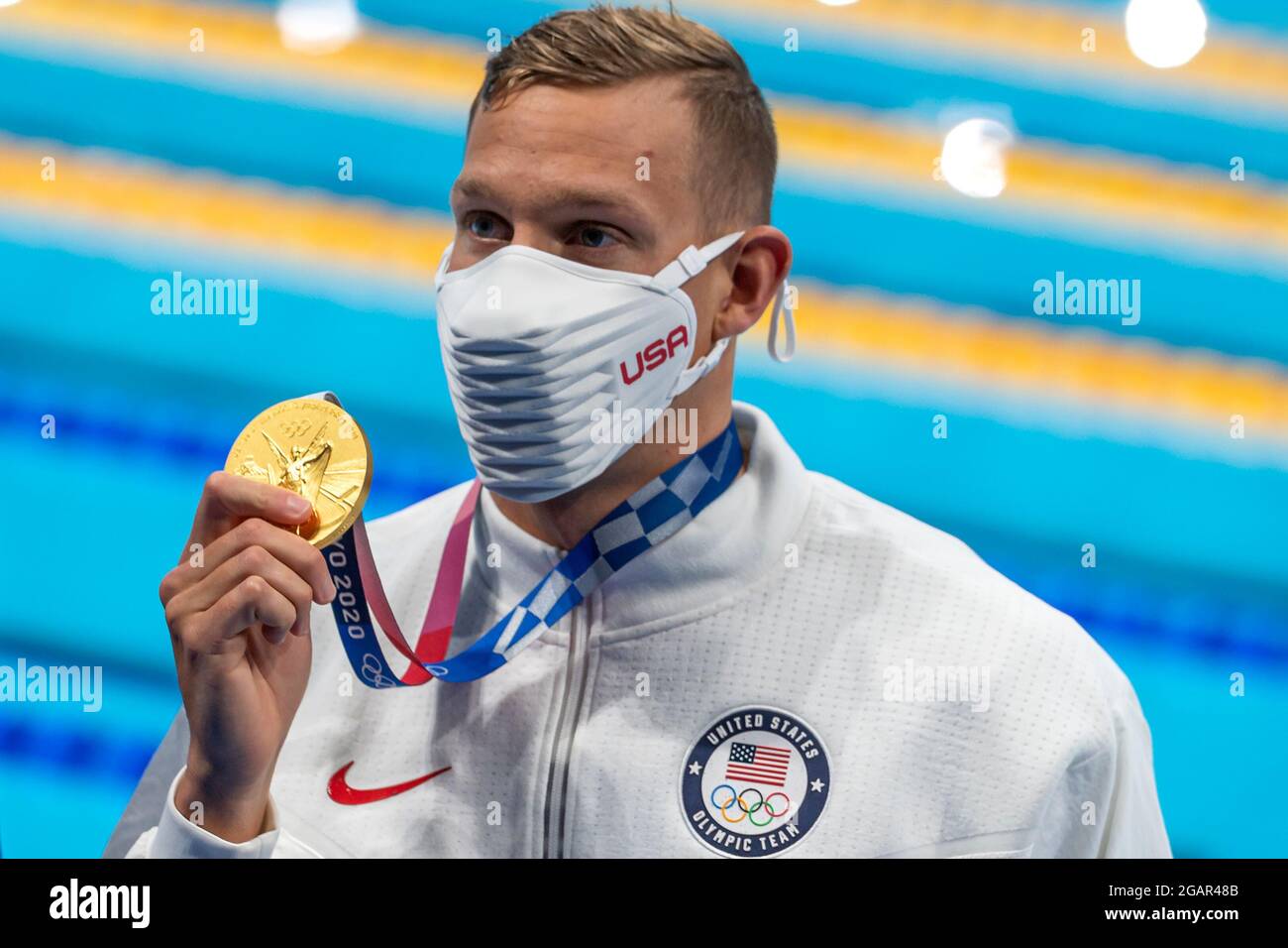 TOKYO, JAPAN - JULY 29: Caeleb Dressel of United States shows the gold ...