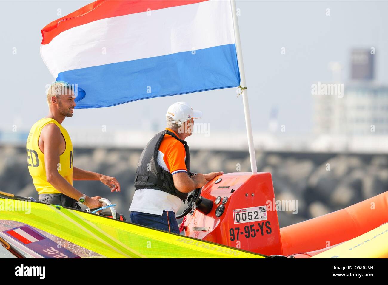 TOKYO, JAPAN - JULY 31: Kiran Badloe of the Netherlands celebrating his golden medal win competing on Men's Windsufer - RS:X during the Tokyo 2020 Olympic Games at the Sagami on July 31, 2021 in Tokyo, Japan (Photo by Ronald Hoogendoorn/Orange Pictures) NOCNSF Stock Photo