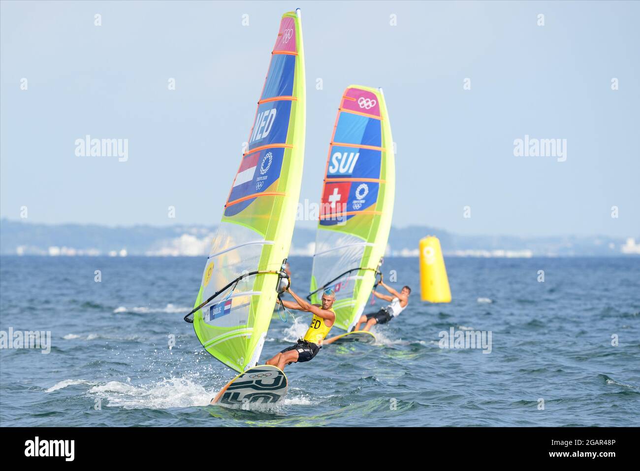 TOKYO, JAPAN - JULY 31: Kiran Badloe of the Netherlands competing on Men's Windsufer - RS:X during the Tokyo 2020 Olympic Games at the Sagami on July 31, 2021 in Tokyo, Japan (Photo by Ronald Hoogendoorn/Orange Pictures) NOCNSF Stock Photo