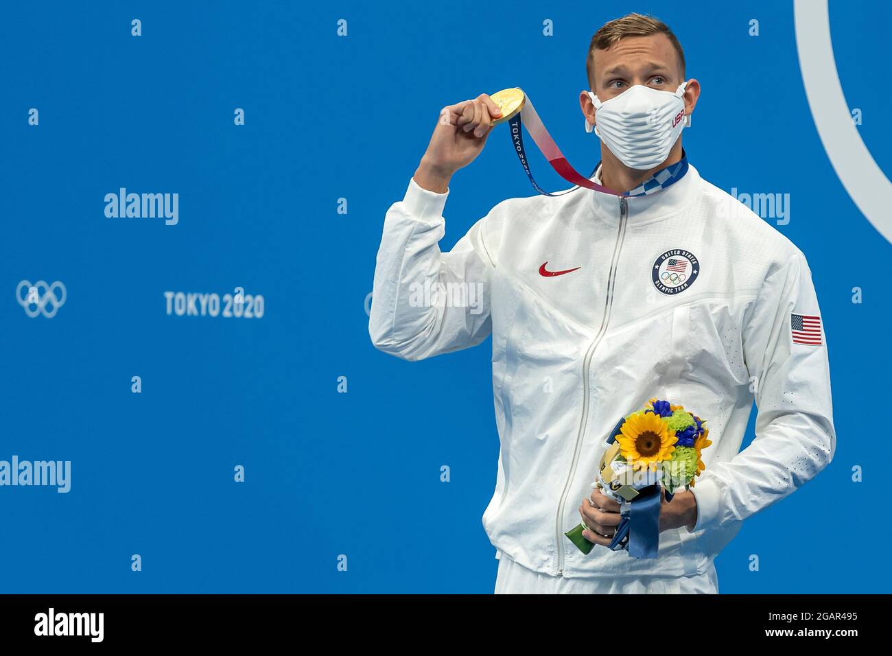 TOKYO, JAPAN - JULY 29: Caeleb Dressel of United States shows the gold ...