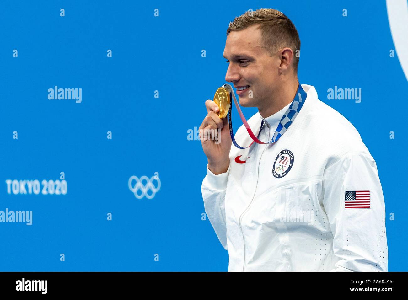 TOKYO, JAPAN - JULY 29: Caeleb Dressel of United States shows the gold ...