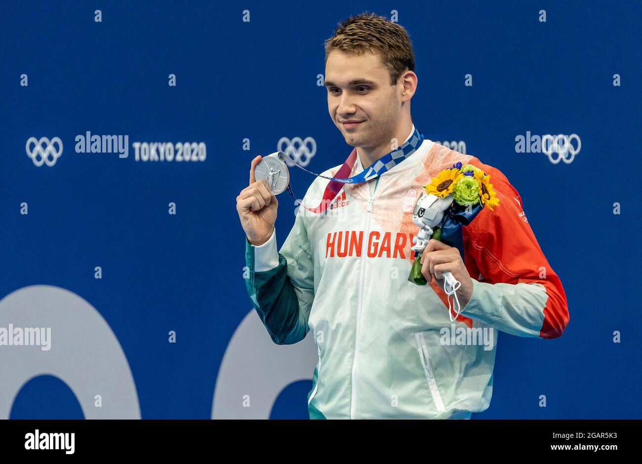 TOKYO, JAPAN - JULY 31: Kristof Milak of Hungary attends the medal ceremony  after winning the silver medal in the men 100m Butterfly final during the  Stock Photo - Alamy