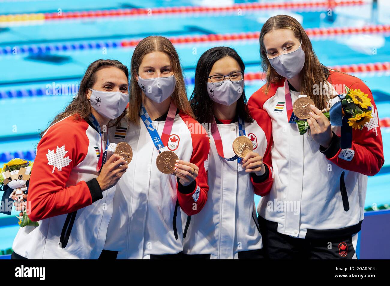Tokyo, Japan. 01st Aug, 2021. TOKYO, JAPAN - AUGUST 1: Kylie Masse, Sydney Pickrem, Margaret Macneil and Penny Oleksiak of Canada show their bronze medals after competing in the women 4x100 medley relay final during the Tokyo 2020 Olympic Games at the Tokyo Aquatics Centre on July 30, 2021 in Tokyo, Japan (Photo by Giorgio Scala/Insidefoto/Deepbluemedia) Credit: insidefoto srl/Alamy Live News Stock Photo
