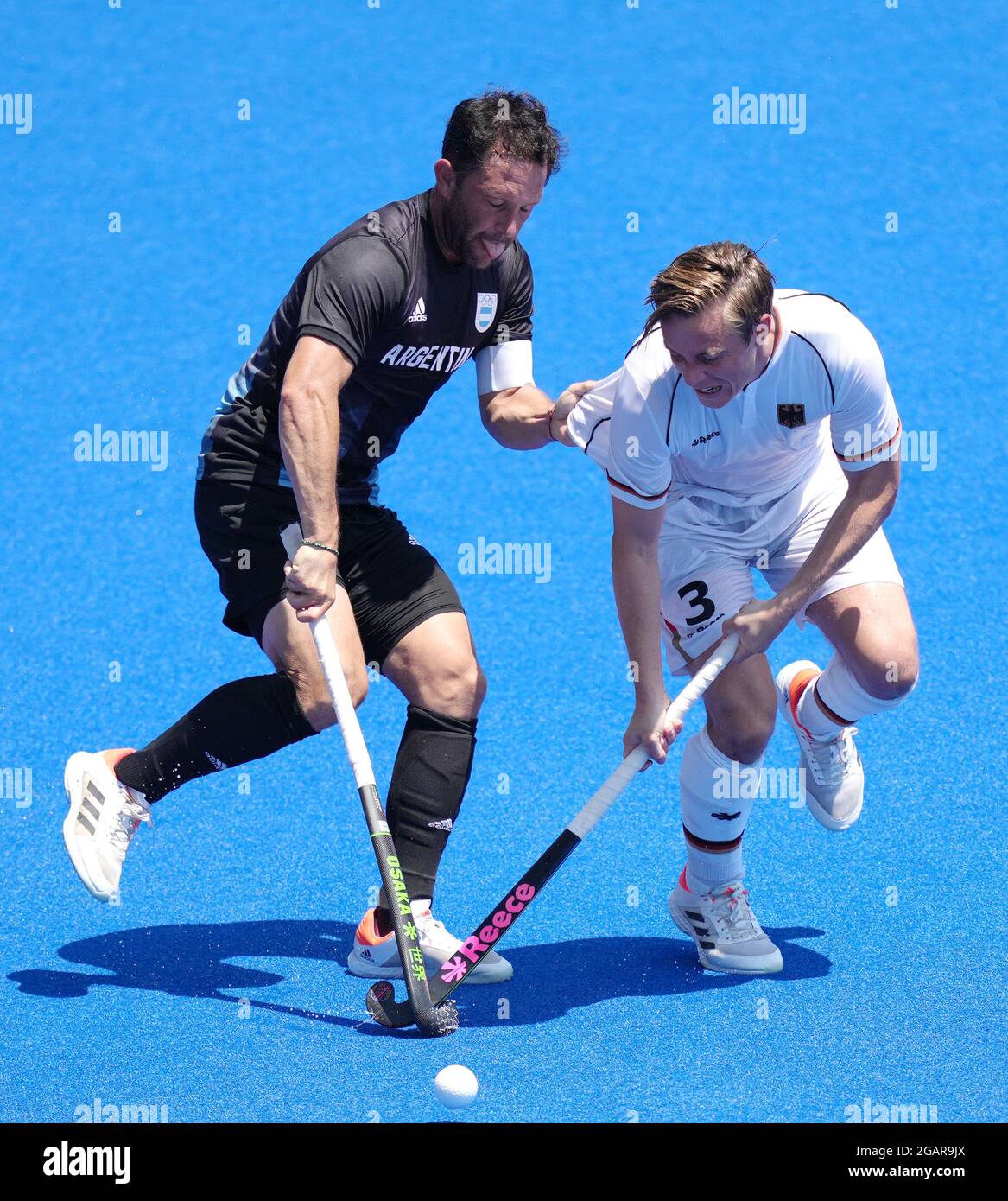 Tokyo, Japan. 1st Aug, 2021. Germany's Mats Jurgen Grambusch (R) competes during the men's quarter final of hockey against Argentina at the Tokyo 2020 Olympic Games in Tokyo, Japan, Aug. 1, 2021. Credit: Yang Shiyao/Xinhua/Alamy Live News Stock Photo