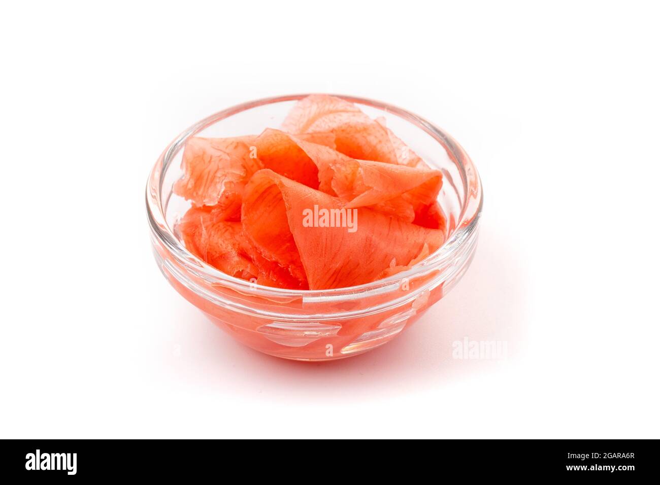 Marinated ginger slices, isolated on white background. High resolution image Stock Photo