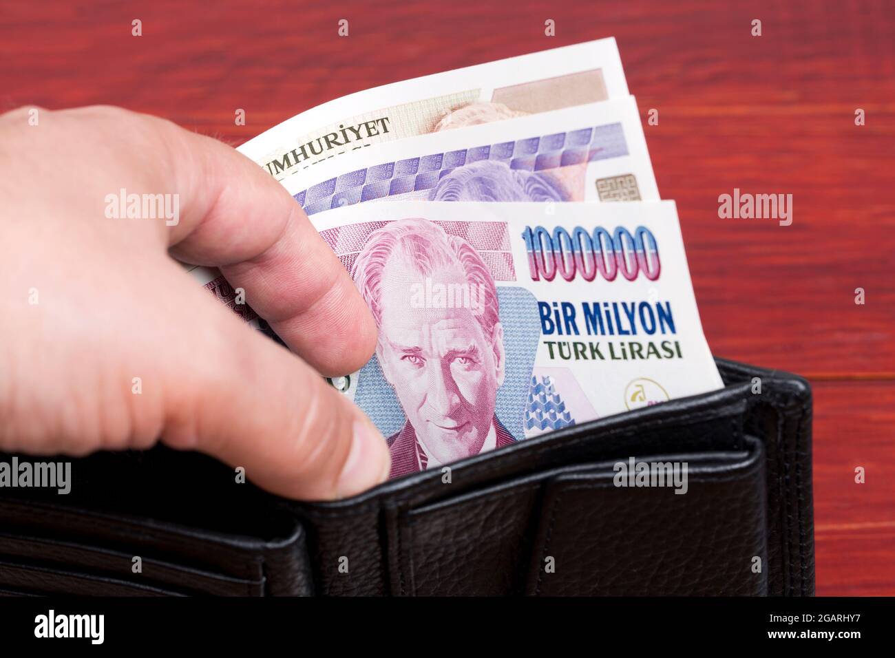 Old Turkish lira in the black wallet Stock Photo Alamy
