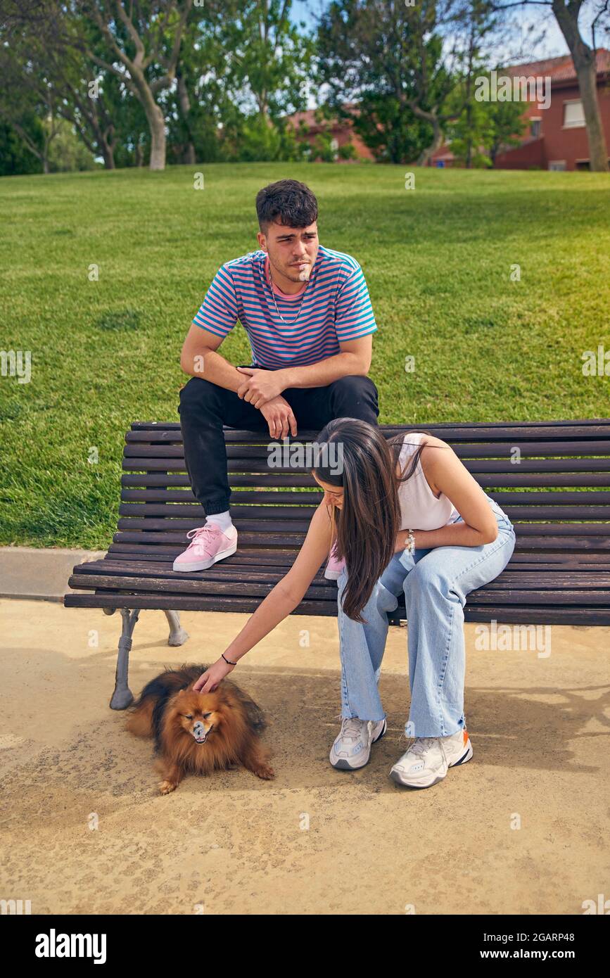 Smart couple walking park hi-res stock photography and images - Alamy