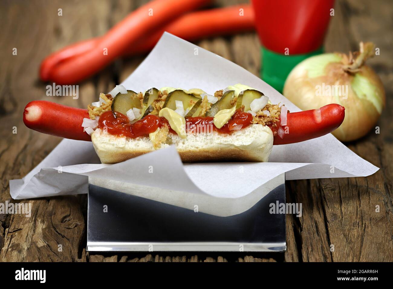 Danish style hot dog with traditional red sausage on rustic wooden  background Stock Photo - Alamy