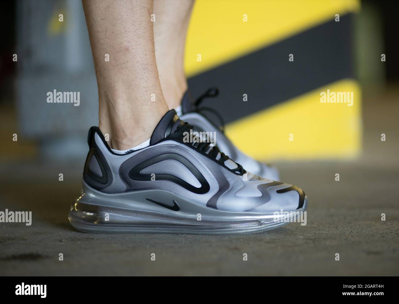 BRCKO DISTRICT, BOSNIA AND HERZEGOVINA - Jun 17, 2020: A close up of male  legs wearing grey Nike Air Max 720 sneakers in Brcko district city, Bosnia  Stock Photo - Alamy