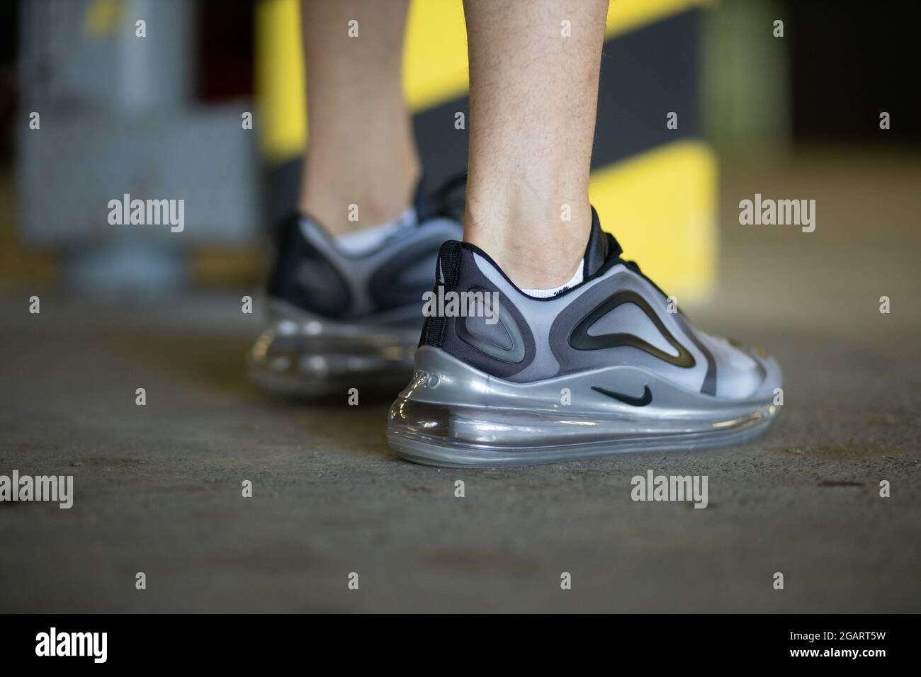 BRCKO DISTRICT, BOSNIA AND HERZEGOVINA - Jun 17, 2020: A close up of male  legs wearing grey Nike Air Max 720 sneakers in Brcko district city, Bosnia  Stock Photo - Alamy