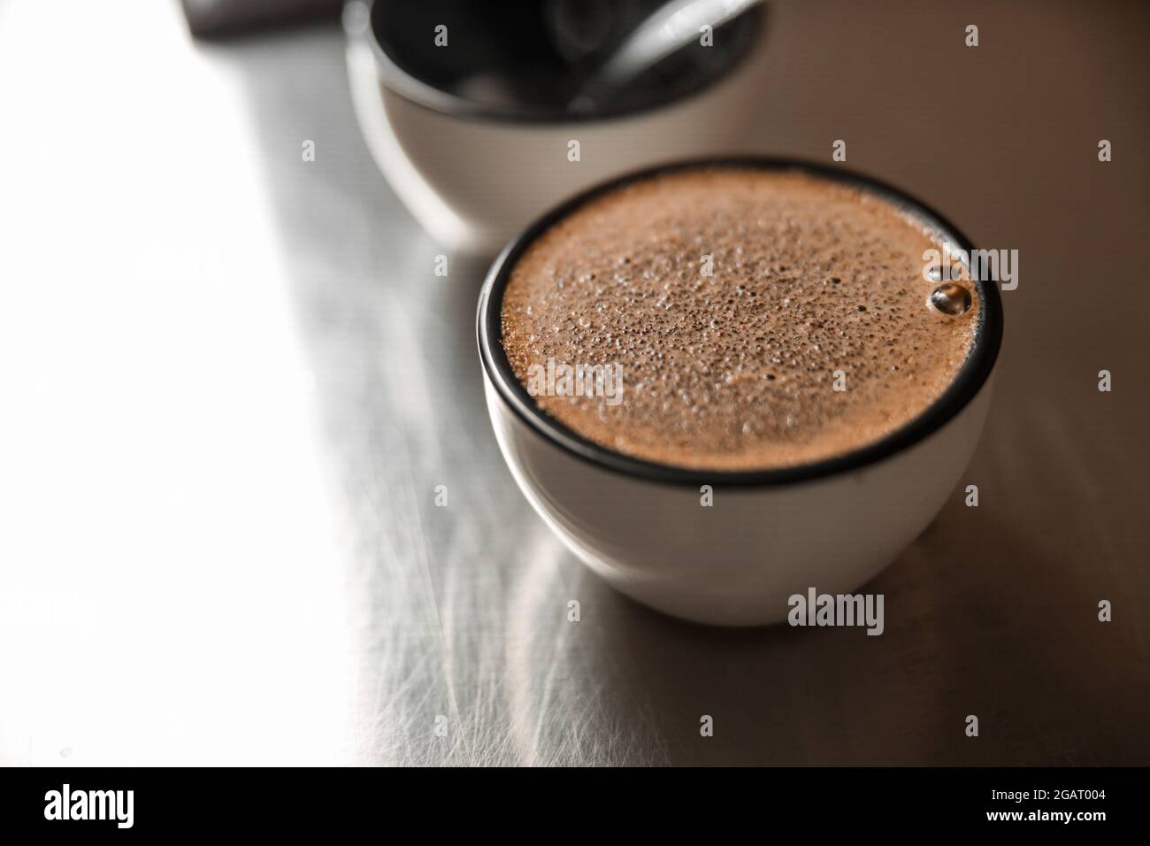 a cup of coffee for testing roasted process Stock Photo