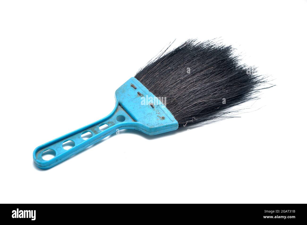 Small broom with a blue handle white background Stock Photo - Alamy