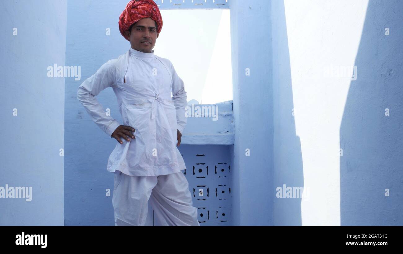 An Indian young man in traditional Indian clothing posing Stock Photo ...