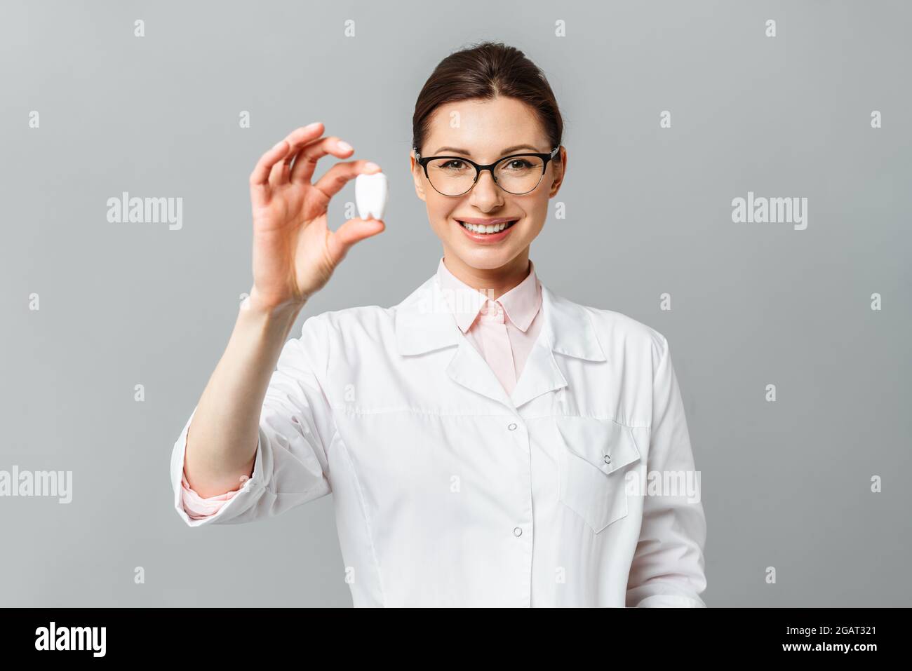 Portrait of a happy doctor dentist. Beautiful female smile. Dentistry