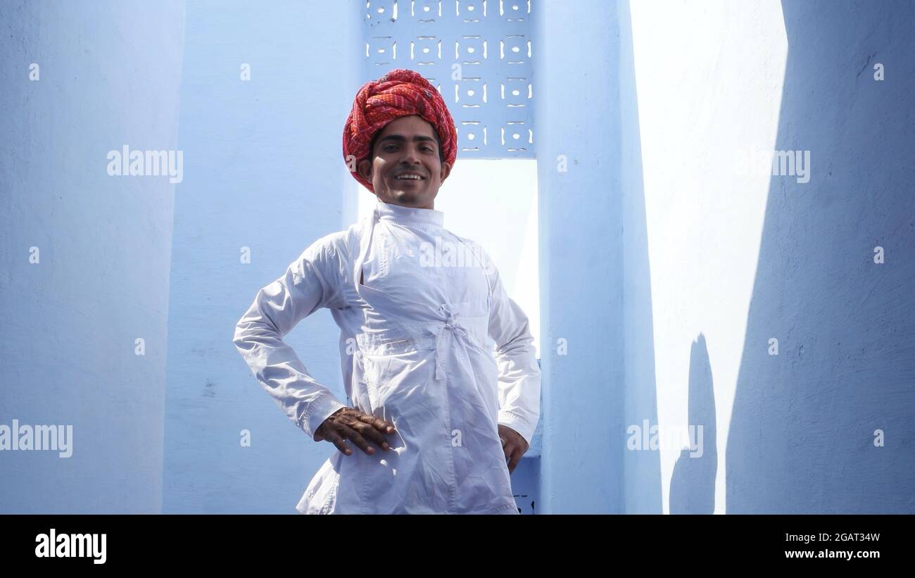 An Indian young man in traditional Indian clothing posing Stock Photo ...