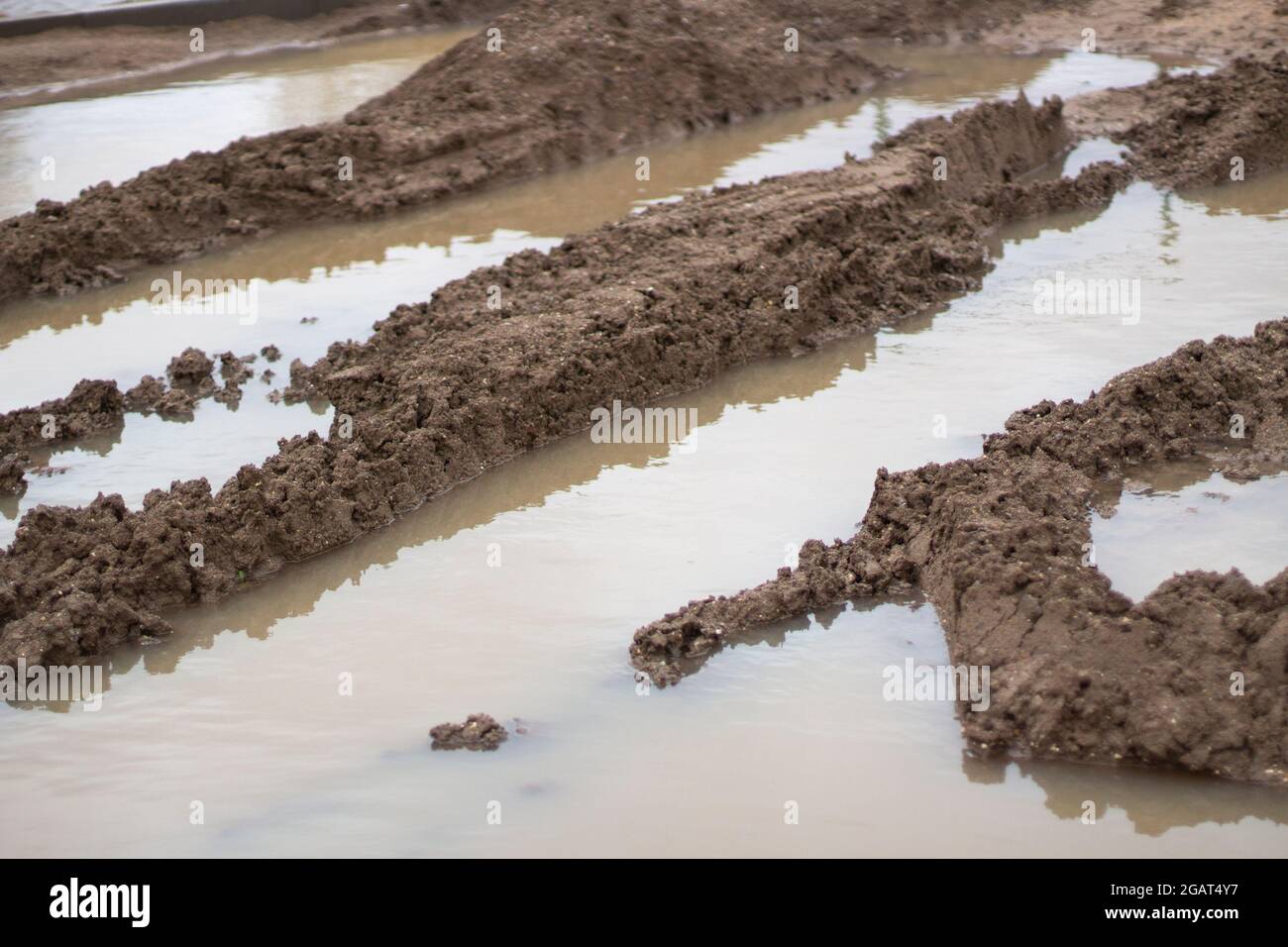 Dirt at a construction site. Dirty road. Off-road after a rainstorm ...