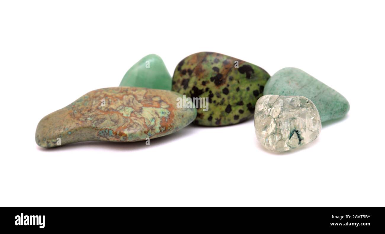 Polished semi precious stones isolated on white background Stock Photo