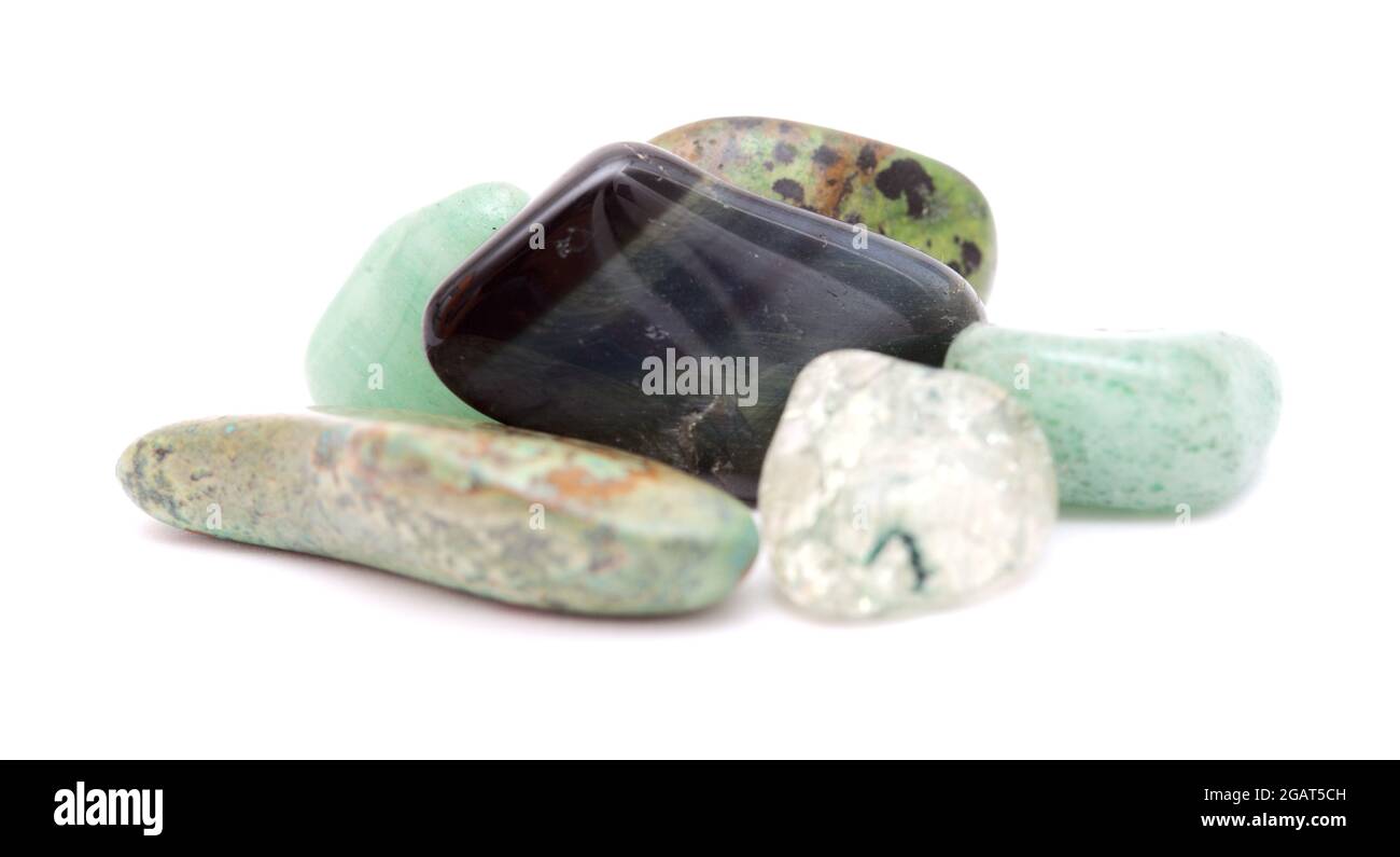 Polished semi precious stones isolated on white background Stock Photo