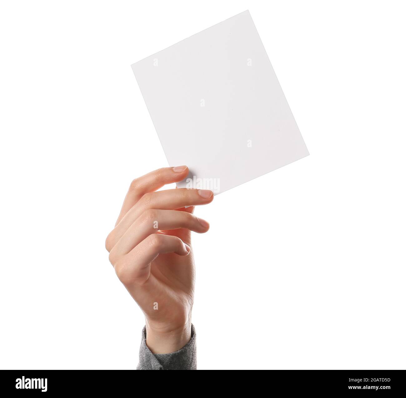Woman holding blank sheet of paper on white background Stock Photo - Alamy