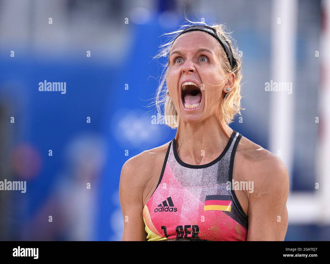 Tokyo, Japan. 1st Aug, 2021. Laura Ludwig of Germany reacts after winning the women's beach volleyball round of 16 match between Margareta Kozuch/Laura Ludwig of Germany and Agatha Bednarczuk/Eduarda Santos Lisboa of Brazil at the Tokyo 2020 Olympic Games in Tokyo, Japan, Aug. 1, 2021. Credit: Li He/Xinhua/Alamy Live News Stock Photo