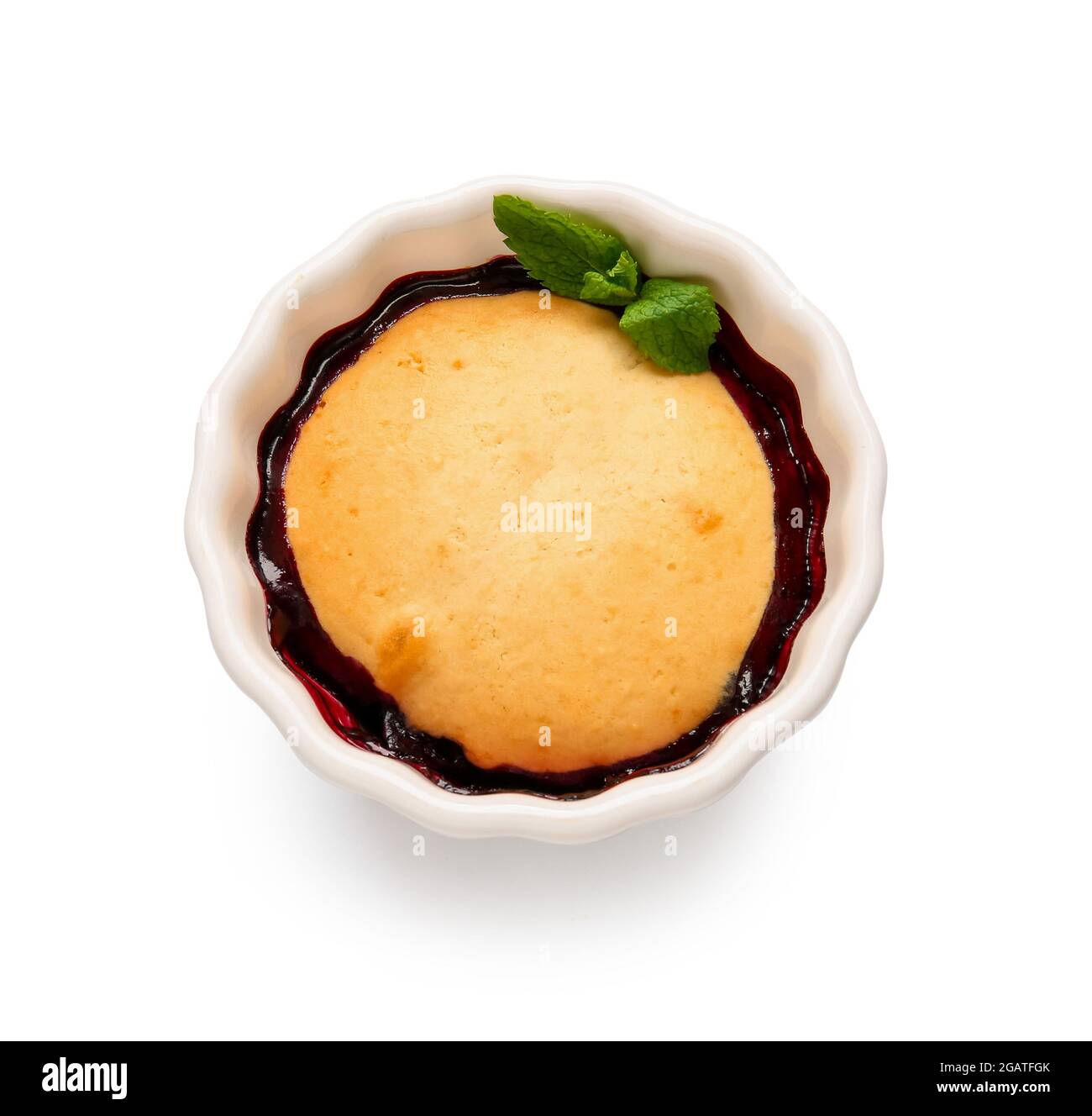 Ramekin with blueberry cobbler on white background Stock Photo - Alamy