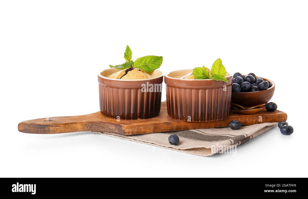 Ramekins with blueberry cobbler on white background Stock Photo - Alamy