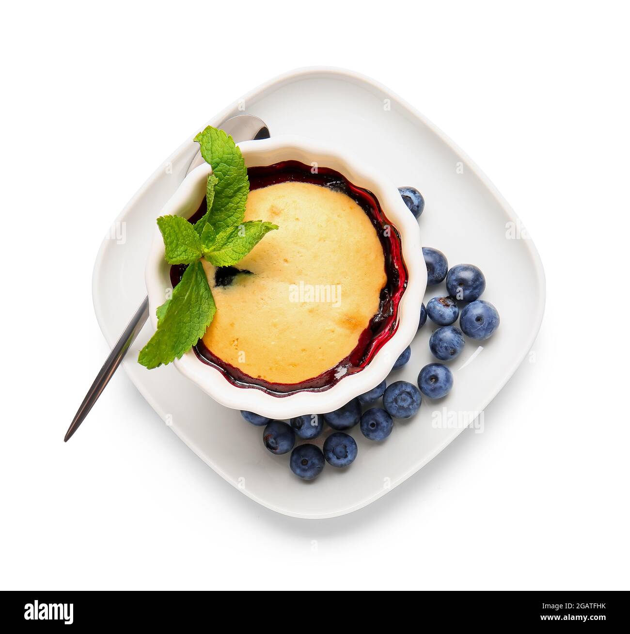 Ramekin with blueberry cobbler on white background Stock Photo - Alamy
