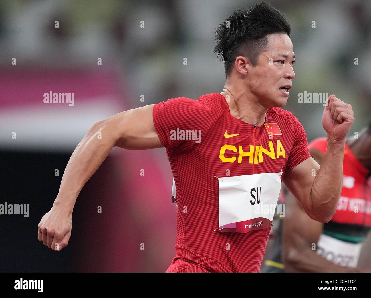 Tokyo, Japan. 1st Aug, 2021. Su Bingtian of China competes during the men's 100m semifinal at Tokyo 2020 Olympic Games, in Tokyo, Japan, Aug. 1, 2021. Credit: Ju Huanzong/Xinhua/Alamy Live News Stock Photo
