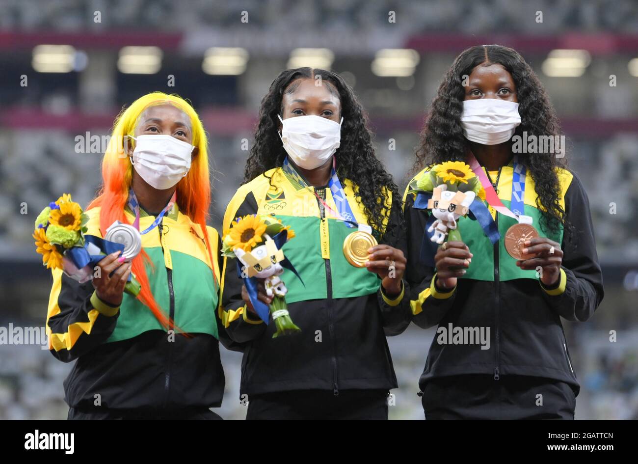 Jamaican sprinters (from L) silver medalist ShellyAnn FraserPryce