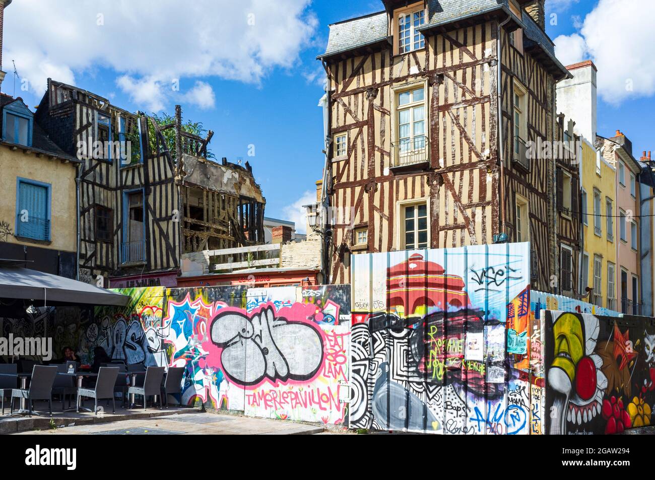 Colourful graffiti and timbered buildings in Rennes, Brittany, France. Stock Photo