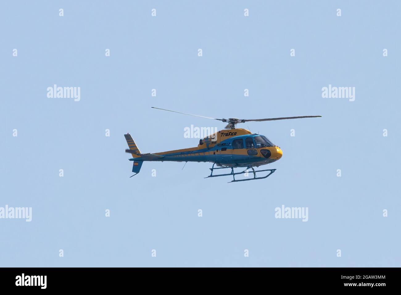 Huelva, Spain - July 30, 2021: Helicopter Pegasus  of the Guardia Civil de Trafico (Civil Traffic Guard) patrolling the roads and highways to control Stock Photo
