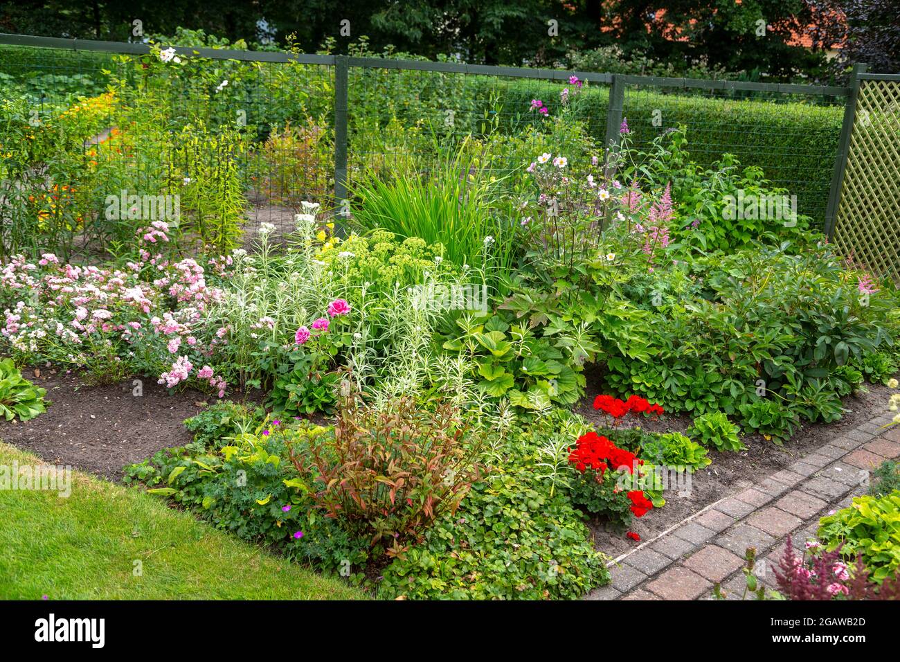 Allotment garden in Denmark with vegetables, fruits, berries, flowers. Of course there is also a garden house.--------------   Kleingarten in Dänemark Stock Photo