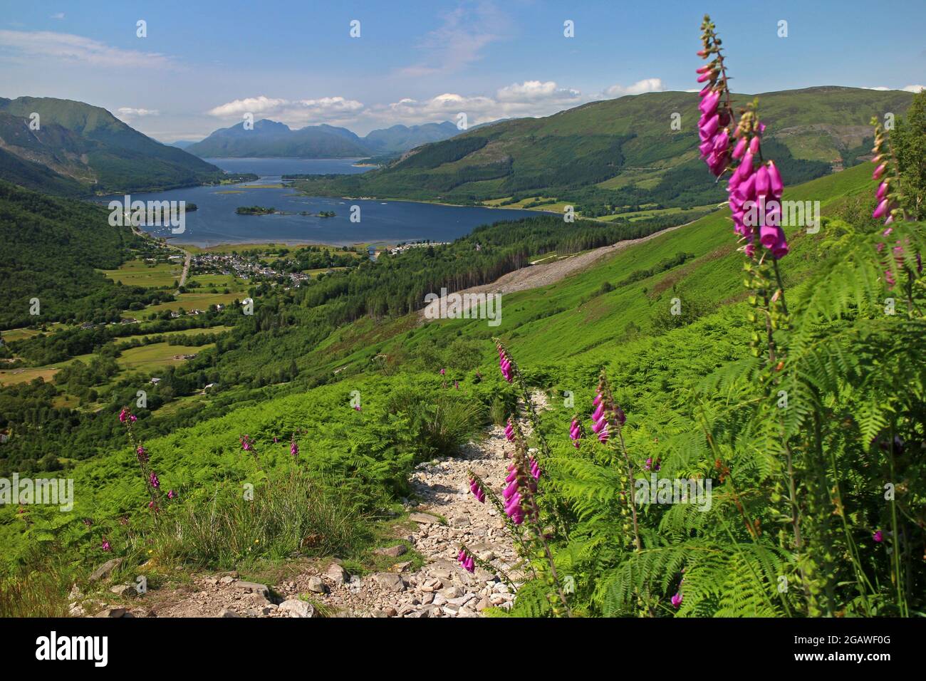 Views of Glencoe village and Loch Leven from path up the Pap of Glencoe, Scotland Stock Photo