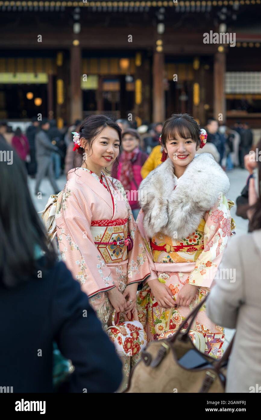 Young women in kimono on Coming of Age Day at Meiji Shrine, Harajuku, Tokyo, Japan Stock Photo