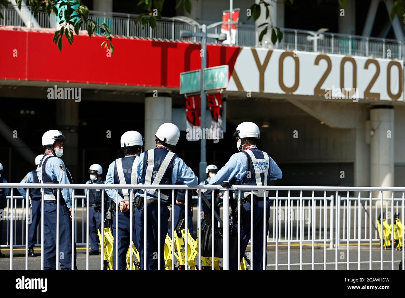 Tokyo, Japan. 31st July, 2021. Security guards in front of the Ibaraki Kashima Stadium, exterior view, feature, symbol photo, border motif, Japan (JPN) - New Zealand (NZL) 4: 2 nE, football, quarter finals of the men, Football Men Quarter-final at Ibaraki Kashima Stadium 07/31/2021 Olympic Summer Games 2020, from 23.07. - 08.08.2021 in Tokyo/Japan. Credit: dpa/Alamy Live News Stock Photo