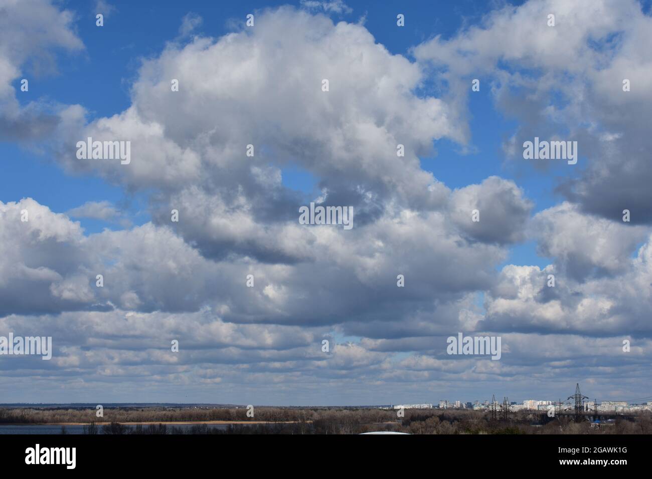 A low angle shot of white clouds in the blue sky Stock Photo - Alamy