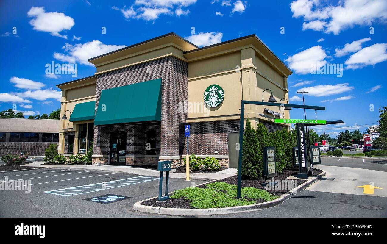 NORWALK, CT, USA - JULY 31, 2021: Starbucks Coffee building near Poet Road in nice summer day Stock Photo