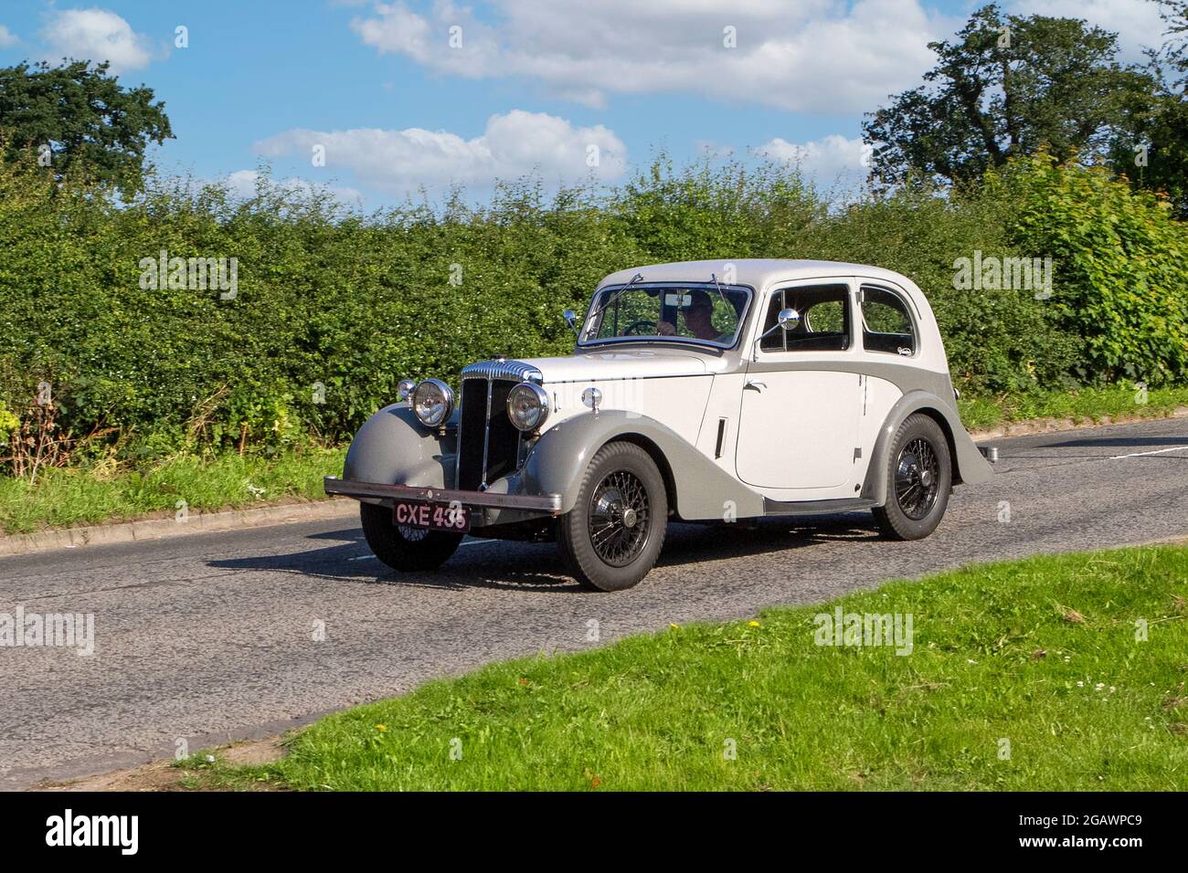 1936, 30s, 1930s pre-war Daimler straight-6, 2003 cc 2dr saloon classic svintage car arriving at the Capesthorne Hall classic car show, UK Stock Photo