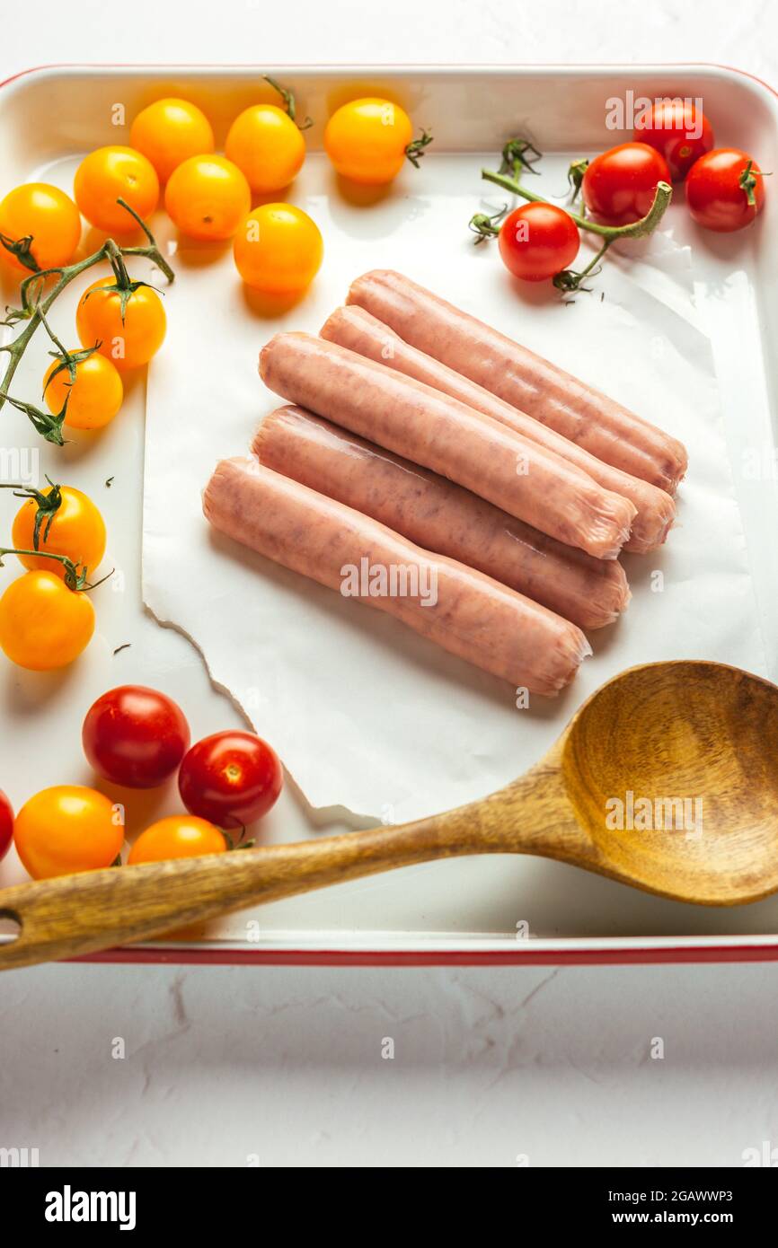 Raw Uncooked Sausages Ready to be Cooked for Breakfast – FOODPIX WHITE SERIES – COPYSPACE Stock Photo