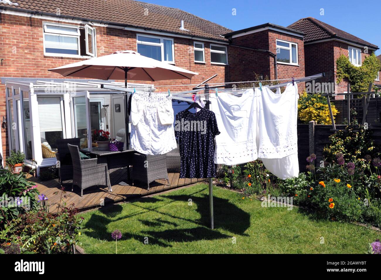 CLEAN LAUNDRY DRYING ON A WASHING LINE Stock Photo