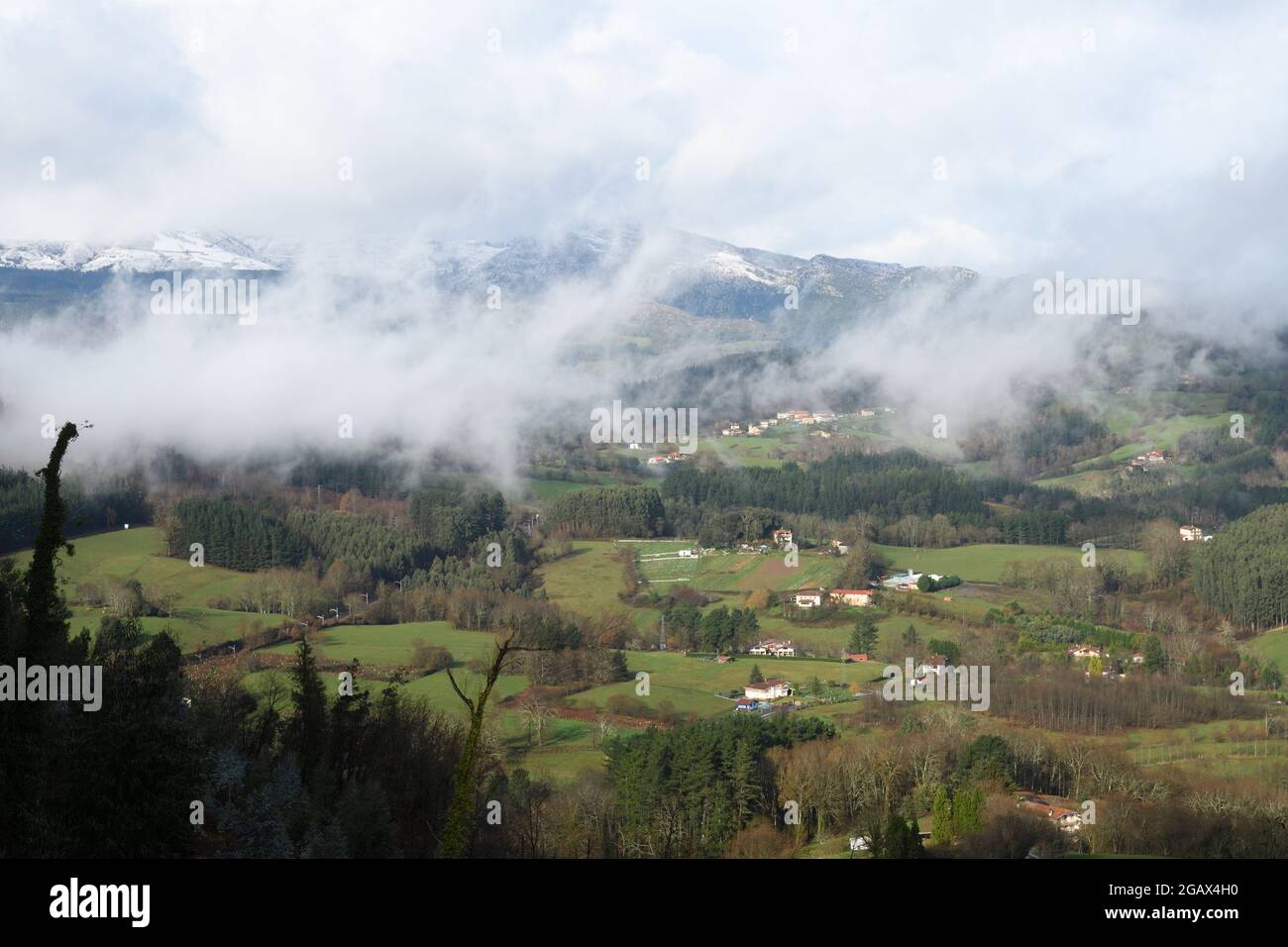 Basque Valley S Basque valleys in the mist from the snowy Mount Kolitxa Stock Photo - Alamy